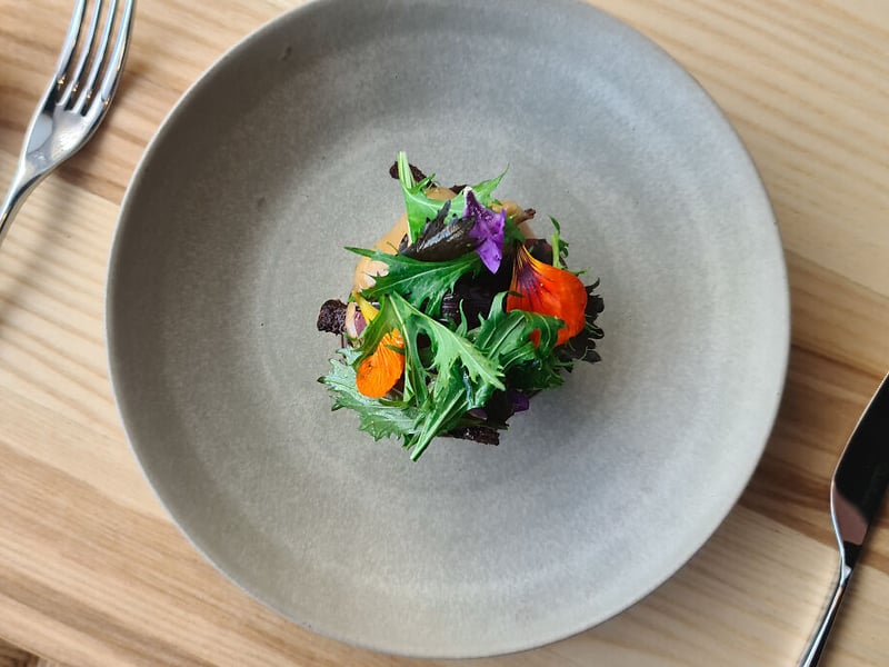 Heron is located in Edinburgh, Lothians. The Good Food Guide says: “Canapés are flawless: a delicately fluted nori cup is filled with fruity, tender langoustine, tart plum and pressed cucumber, while a wafer-thin croustade combines rich, herbal gribiche with musky flakes of Arbroath smokie.”